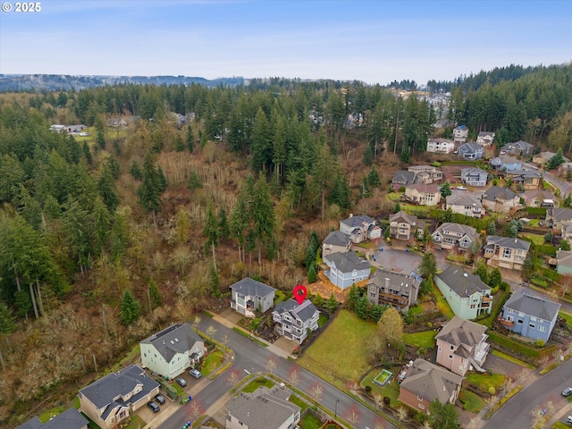 aerial view with a forest view and a residential view