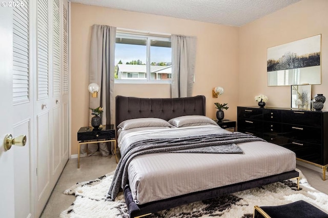 15580 SW Royalty Pkwy, Portland, OR 97224 - carpeted bedroom featuring baseboards and a closet