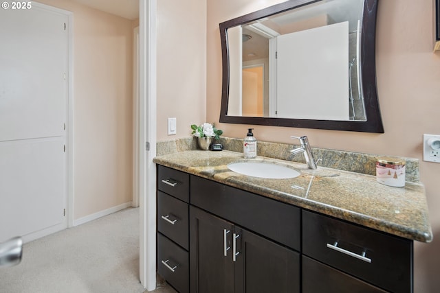 15580 SW Royalty Pkwy, Portland, OR 97224 - bathroom featuring vanity and baseboards