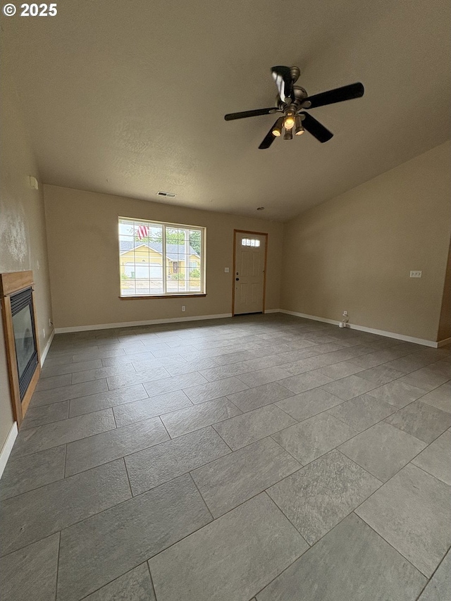 986 Arthur Ave, Cottage Grove, OR 97424 - unfurnished living room featuring a glass covered fireplace and ceiling fan
