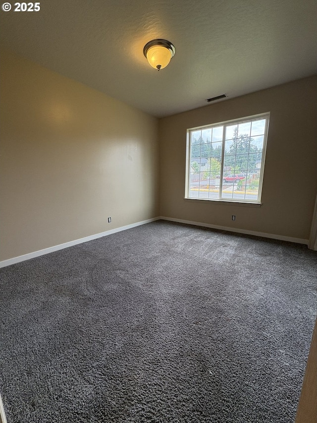 986 Arthur Ave, Cottage Grove, OR 97424 - unfurnished room featuring baseboards and carpet