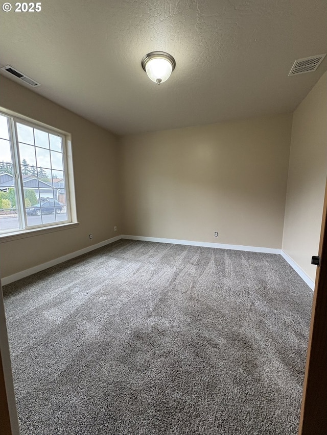 986 Arthur Ave, Cottage Grove, OR 97424 - carpeted spare room featuring baseboards and a textured ceiling