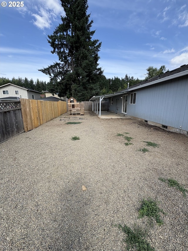 986 Arthur Ave, Cottage Grove, OR 97424 - fenced backyard featuring a patio