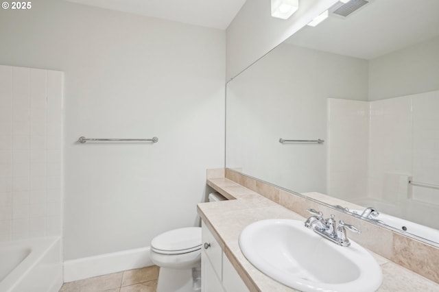 bathroom featuring vanity, toilet, and tile patterned floors