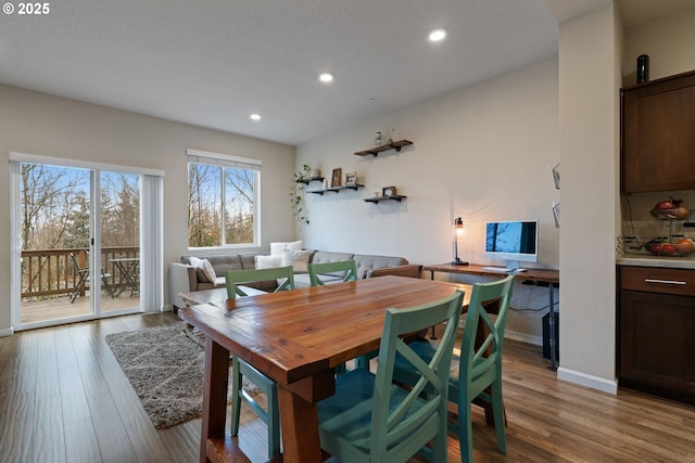 dining area with light wood-type flooring