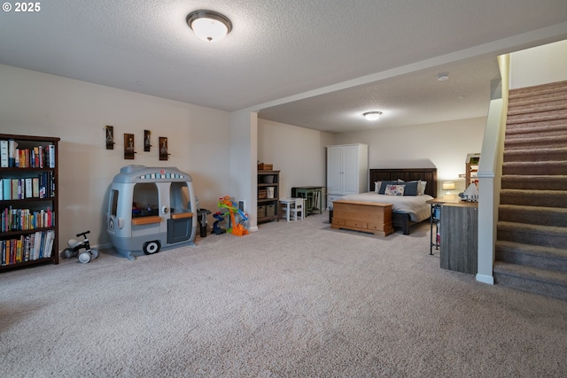 carpeted bedroom featuring a textured ceiling