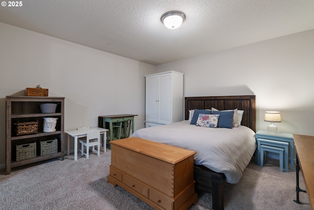 carpeted bedroom with a textured ceiling