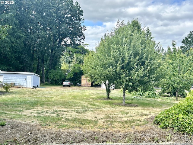 21223 NW Bendemeer Rd, Hillsboro, OR 97124 - view of grassy yard featuring a storage shed