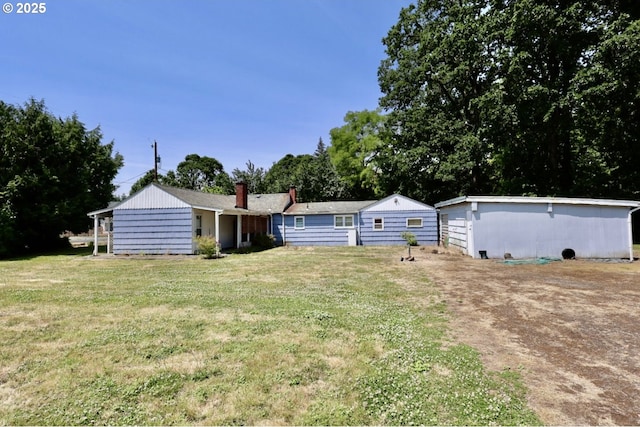 21223 NW Bendemeer Rd, Hillsboro, OR 97124 - ranch-style home with a front lawn and a chimney
