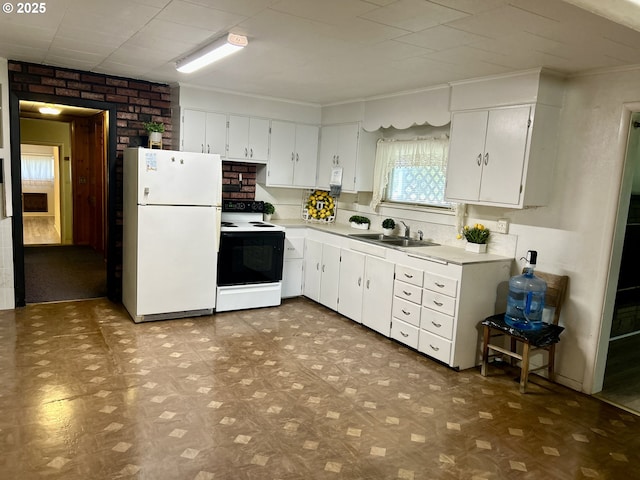 21223 NW Bendemeer Rd, Hillsboro, OR 97124 - kitchen with white appliances, tile patterned floors, light countertops, white cabinetry, and crown molding
