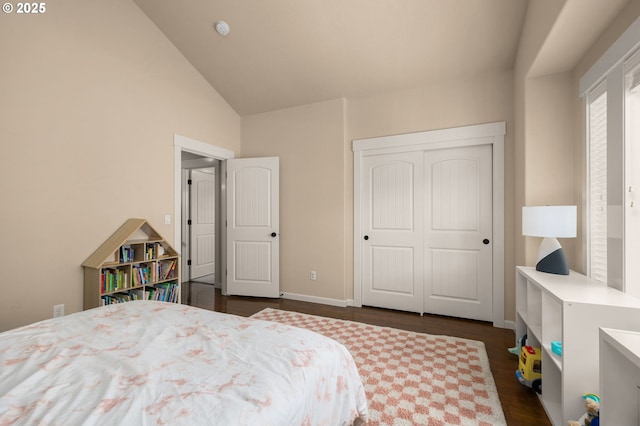 17760 SW Robert Ln, Beaverton, OR 97078 - bedroom with dark wood-style floors, a closet, and high vaulted ceiling