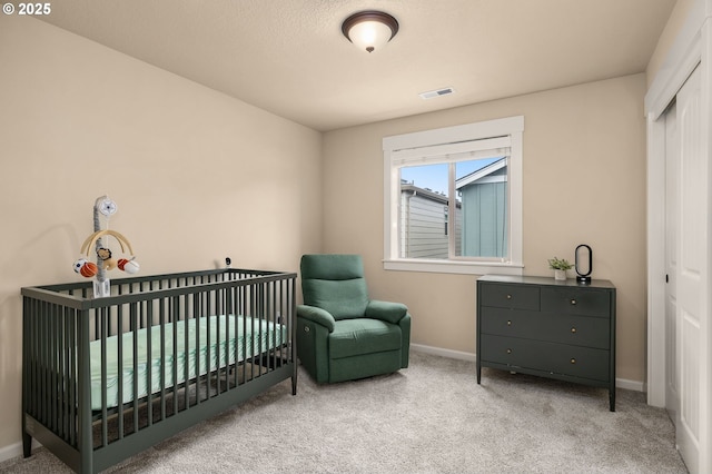17760 SW Robert Ln, Beaverton, OR 97078 - carpeted bedroom with a closet and a crib