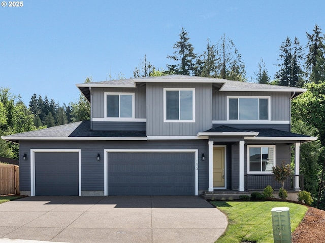 1624 NE Josephine Ct Unit 177, Estacada, OR 97023 - view of front of house with concrete driveway, a garage, roof with shingles, and a porch