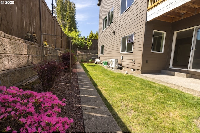 view of yard with a patio area and a fenced backyard