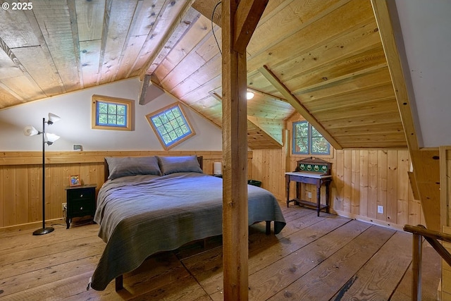 83863 Ollokot Ln, Joseph, OR 97846 - bedroom featuring wood walls, hardwood / wood-style flooring, multiple windows, wooden ceiling, and wainscoting