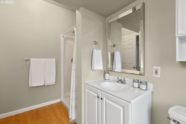 320 NE 75th Ave, Portland, OR 97213 - bathroom with wood finished floors, vanity, and a shower with curtain