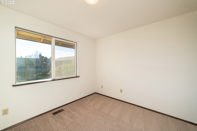 empty room with carpet floors