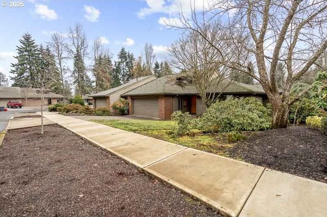 single story home featuring a garage