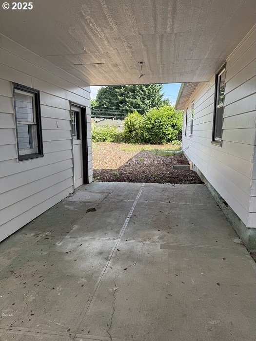 1640 Manor Dr, Gladstone, OR 97027 - view of patio featuring a carport
