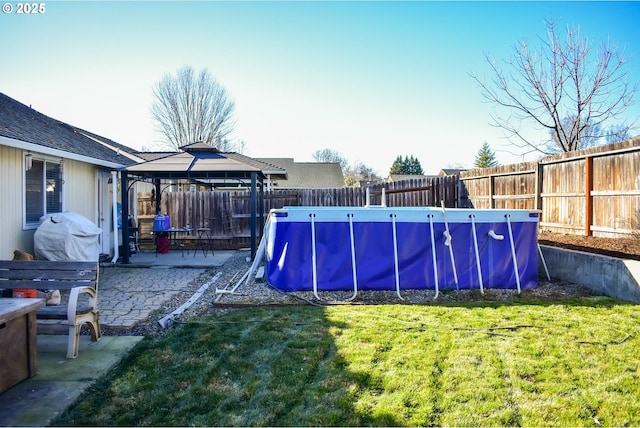 view of swimming pool featuring a gazebo, a patio area, and a lawn