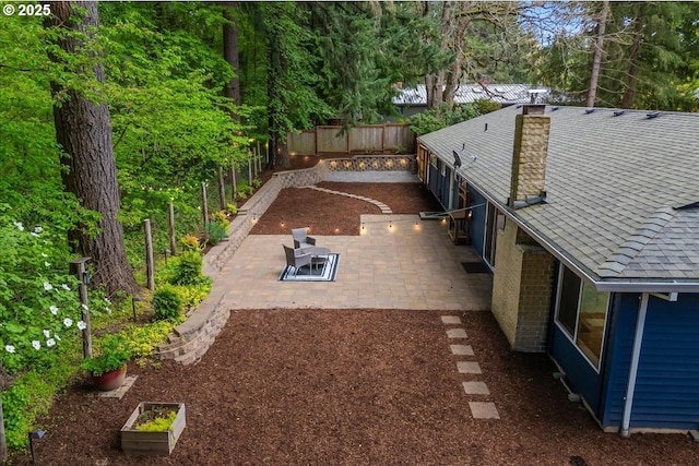 view of yard with a fenced backyard and a patio