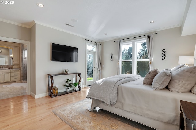 bedroom featuring access to exterior, crown molding, light hardwood / wood-style flooring, and ensuite bathroom