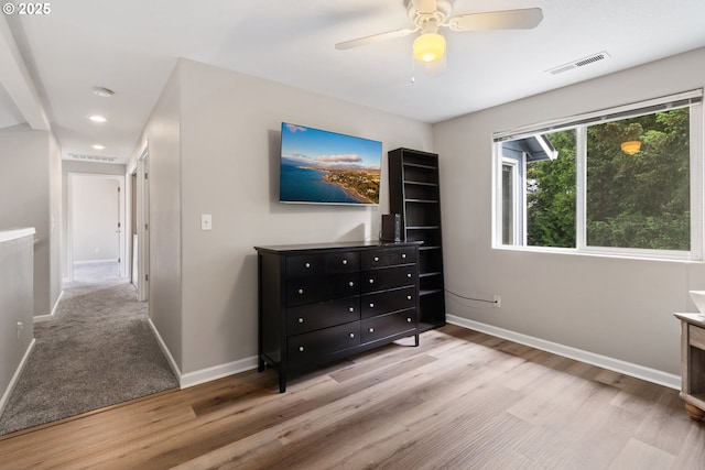 bedroom featuring light wood-style floors, baseboards, recessed lighting, and a ceiling fan