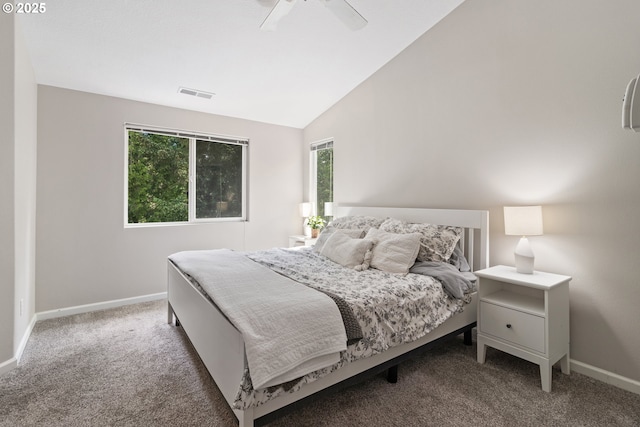 carpeted bedroom with baseboards, vaulted ceiling, and ceiling fan
