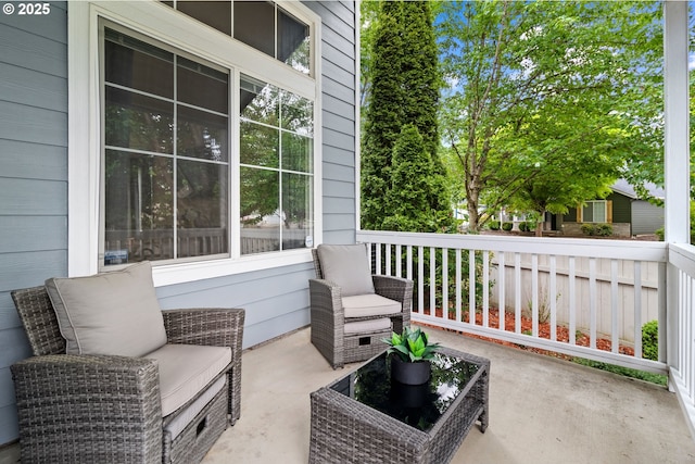 view of patio featuring a porch