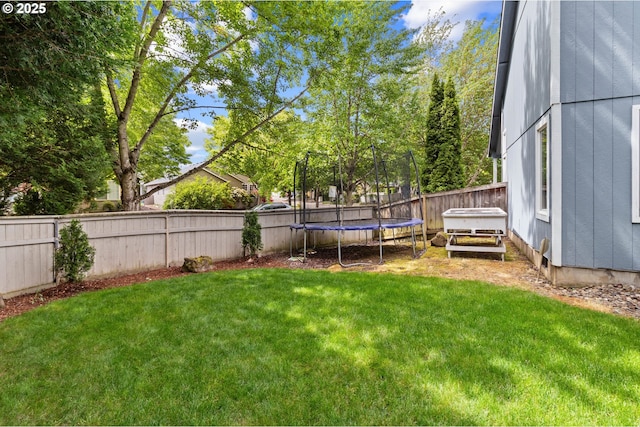 view of yard featuring a trampoline