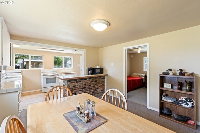 1548 Harlan St, Roseburg, OR 97471 - dining room featuring baseboards