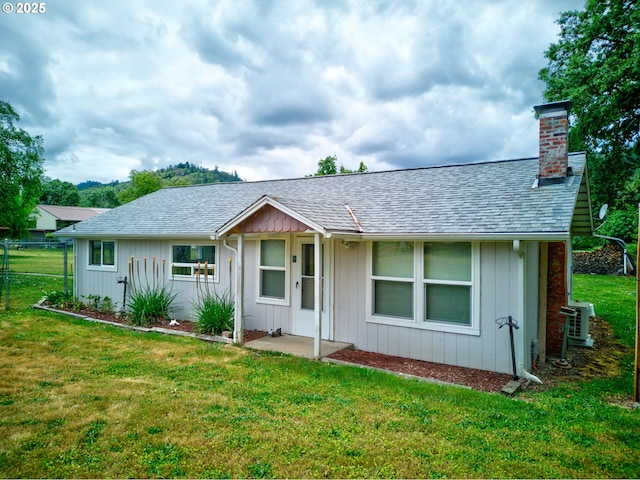 1548 Harlan St, Roseburg, OR 97471 - single story home featuring a chimney, a shingled roof, and central air condition unit