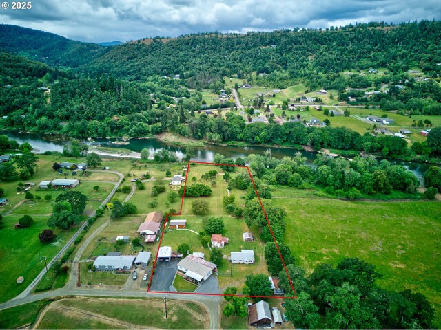 1548 Harlan St, Roseburg, OR 97471 - aerial view of property's location with property parcel outlined and a large body of water