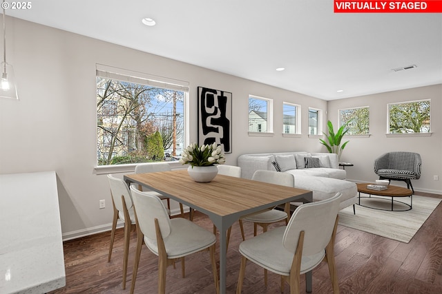 dining space featuring recessed lighting, visible vents, baseboards, and wood finished floors