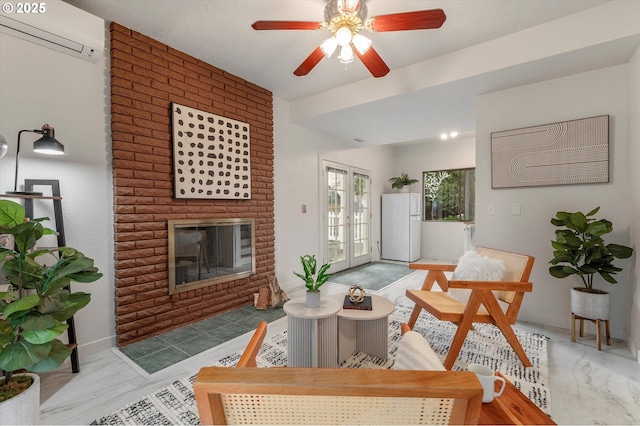 living room featuring a fireplace, a ceiling fan, and a wall mounted AC