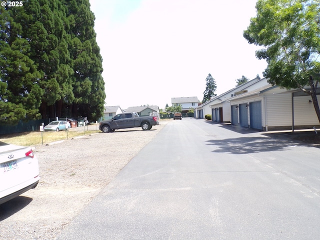 4792 Lancaster Dr NE, Salem, OR 97305 - view of asphalt road featuring community garages