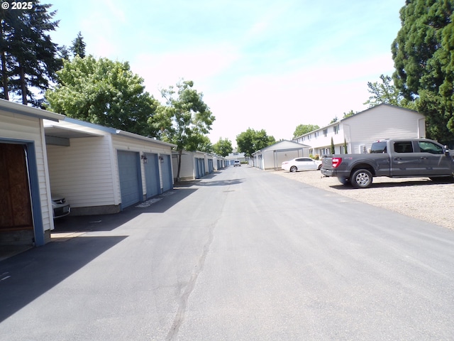 4792 Lancaster Dr NE, Salem, OR 97305 - view of asphalt street featuring community garages