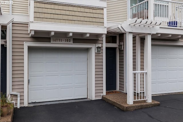 garage with driveway