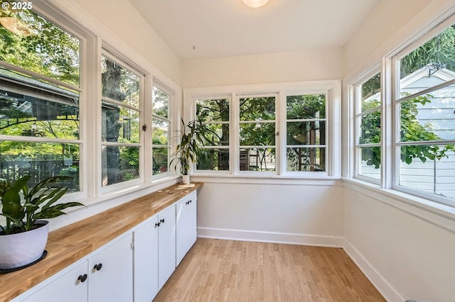 3954 NE 38th Ave, Portland, OR 97212 - unfurnished sunroom with wood finished floors and healthy amount of natural light