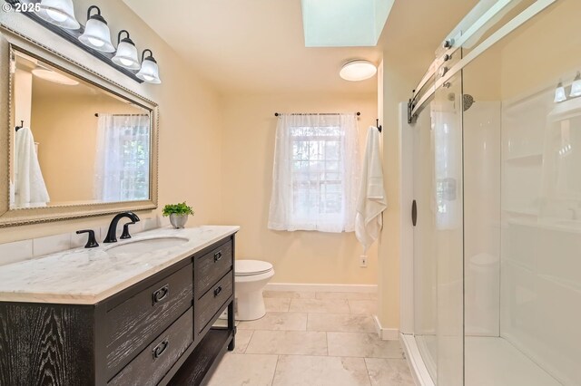 3954 NE 38th Ave, Portland, OR 97212 - full bath featuring a shower stall, vanity, a skylight, and tile patterned flooring