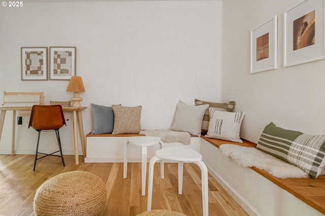 living area with wood finished floors