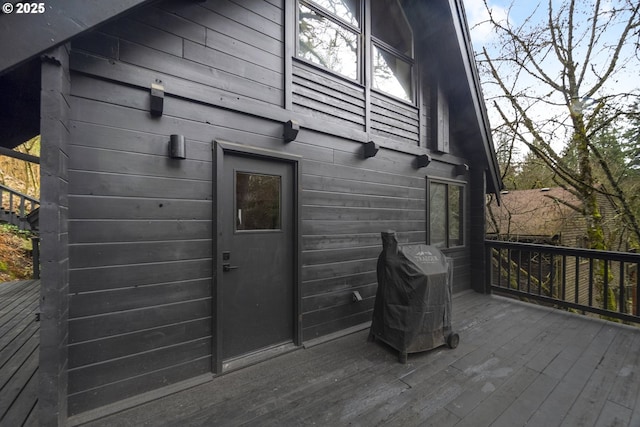 wooden terrace with grilling area