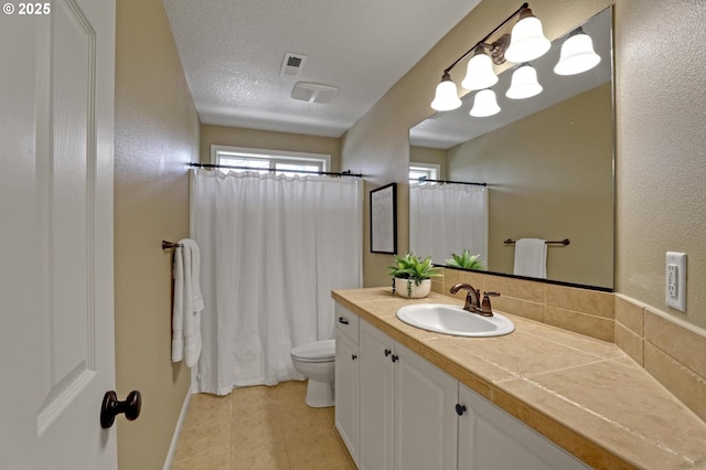 13129 NW Alvada St, Portland, OR 97229 - full bathroom featuring a shower with shower curtain, vanity, tile patterned flooring, toilet, and visible vents