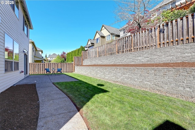 13129 NW Alvada St, Portland, OR 97229 - view of yard with a patio, a fenced backyard, and a residential view
