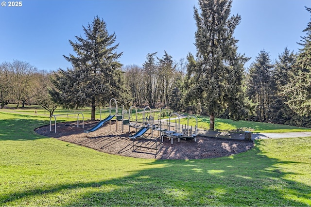 view of jungle gym with a lawn