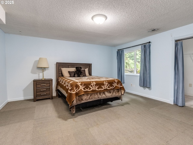 12309 SE Riveridge Dr, Vancouver, WA 98683 - carpeted bedroom featuring a textured ceiling and baseboards