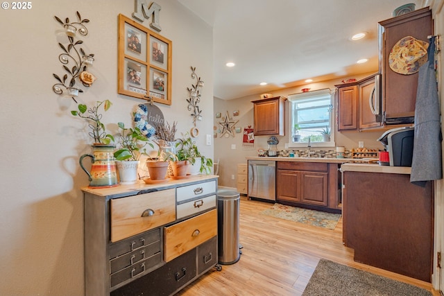 4309 C St, Washougal, WA 98671 - kitchen featuring dishwasher, recessed lighting, light wood-style flooring, light countertops, and brown cabinetry