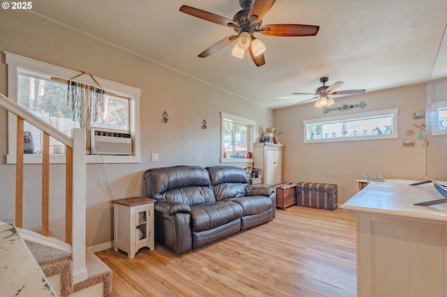4309 C St, Washougal, WA 98671 - living room featuring light wood finished floors, ceiling fan, and cooling unit
