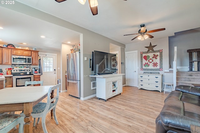 4309 C St, Washougal, WA 98671 - kitchen with ceiling fan, stainless steel appliances, open floor plan, light countertops, and recessed lighting
