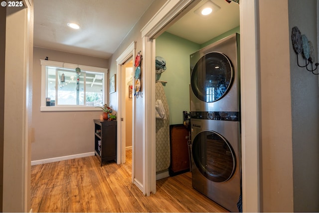 4309 C St, Washougal, WA 98671 - laundry room with estacked washer and dryer, wood finished floors, baseboards, and recessed lighting